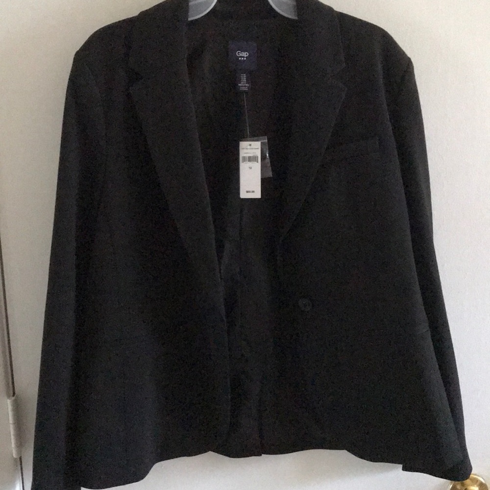Woman’s black blazer. Brand new